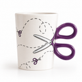 Taza de cerámica tijeras